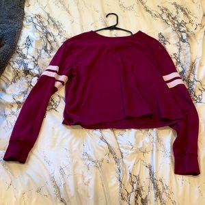A maroon sweater
